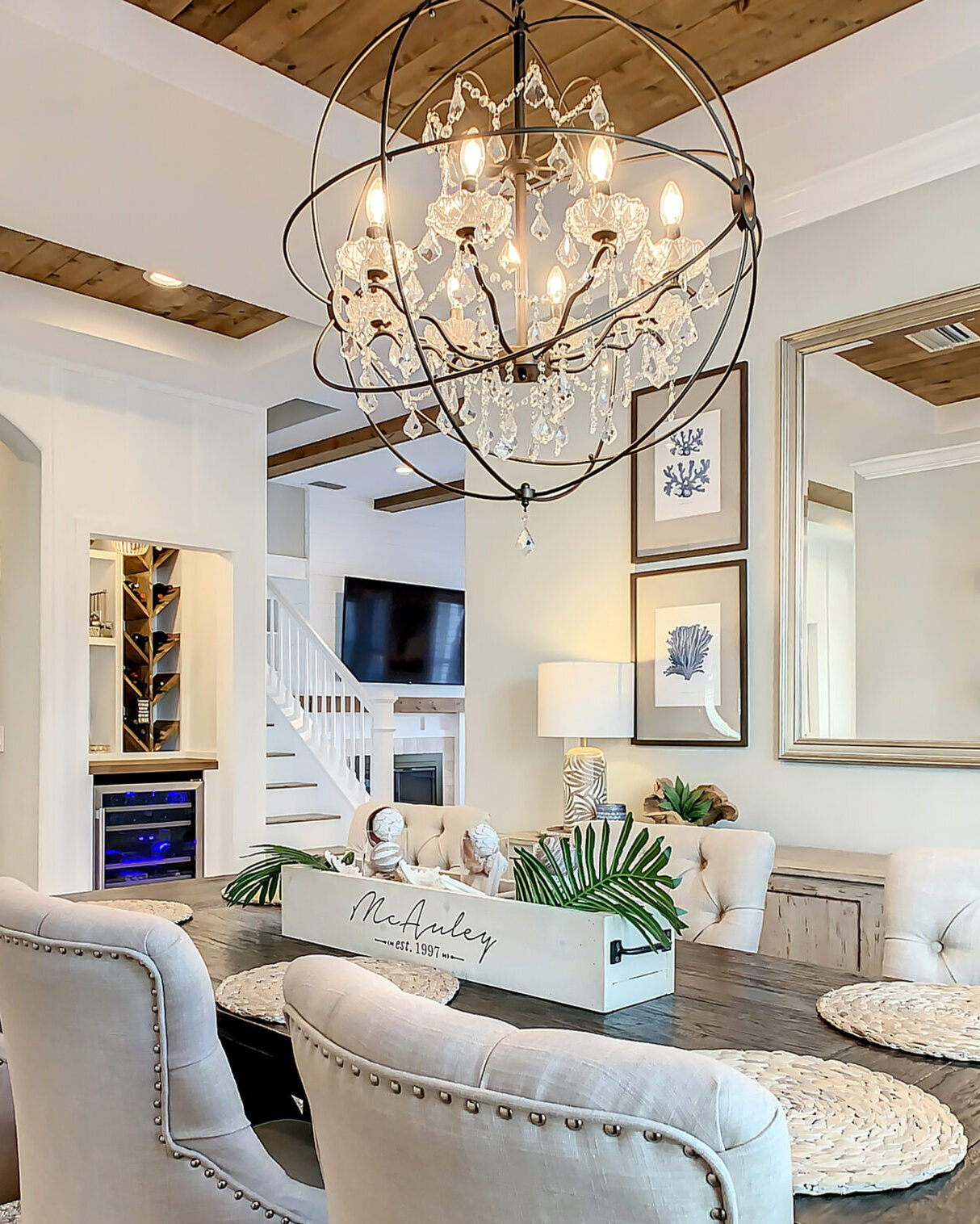 Dining room in a luxury home with white walls and wood accents