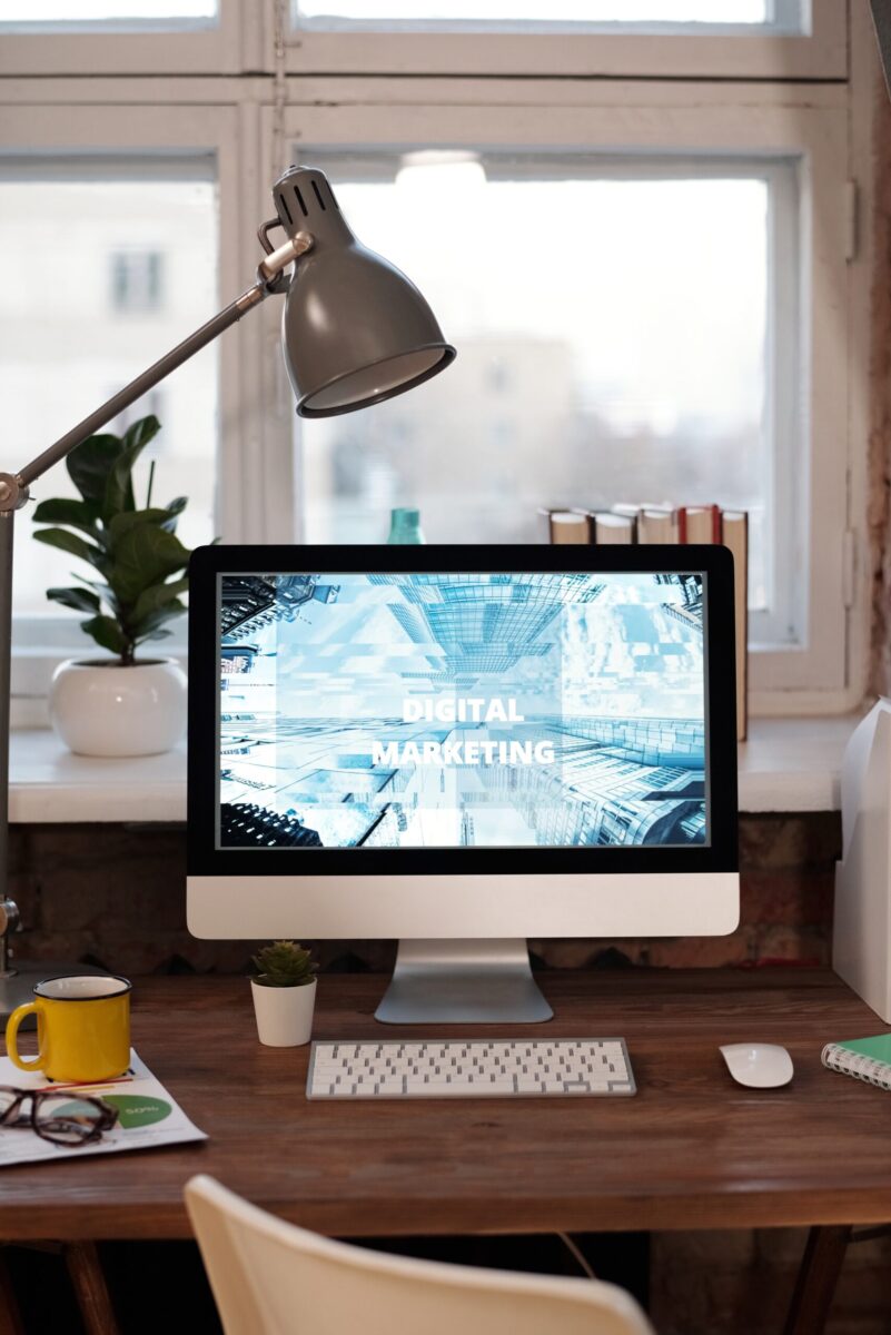 desktop computer showing digital marketing on the screen